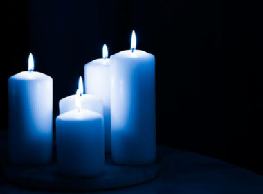 Blue candles demonstrating their deeper spiritual meaning